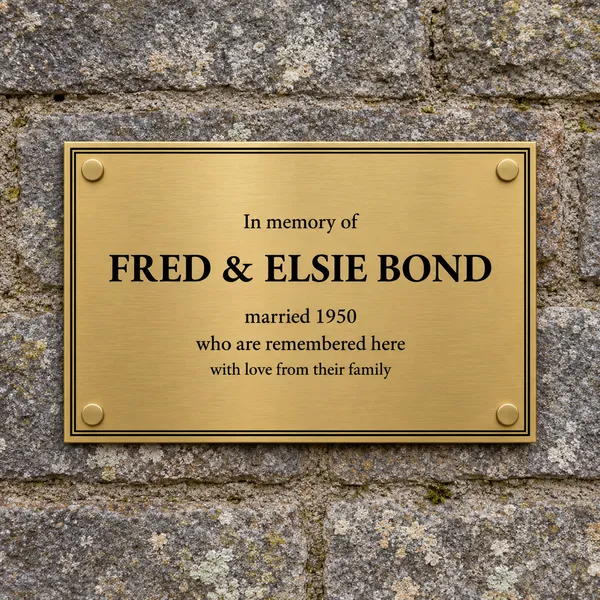 Personalised brushed brass plaque 210 × 148 mm, shown with example wording