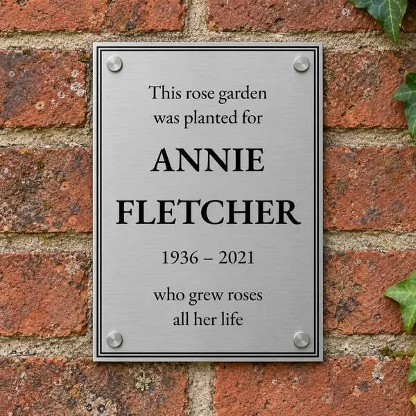 Personalised brushed stainless steel plaque 148 × 210 mm, shown with example wording