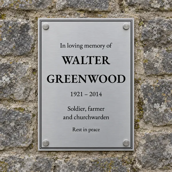 Personalised brushed stainless steel plaque 210 × 297 mm, shown with example wording