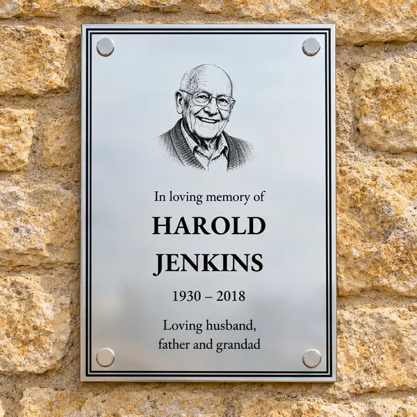Personalised polished stainless steel plaque 148 × 210 mm, shown with example wording