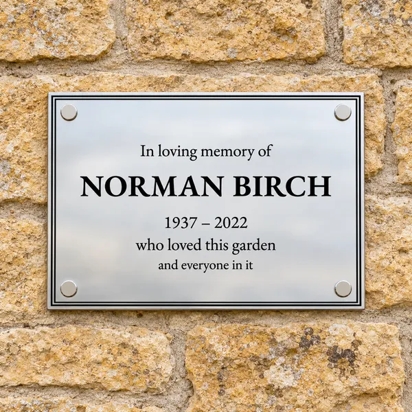 Personalised polished stainless steel plaque 200 × 150 mm, shown with example wording