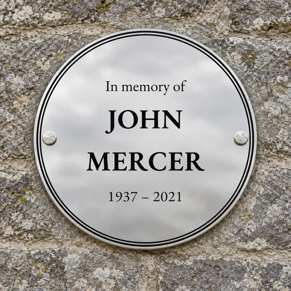 Personalised polished stainless steel circular plaque 200 × 200 mm, shown with example wording