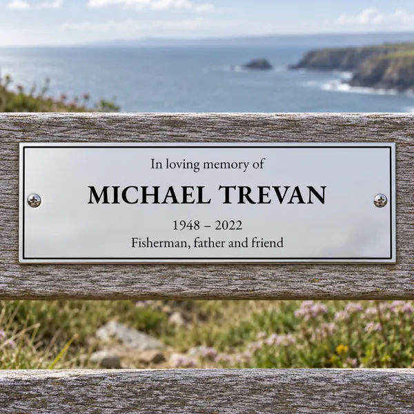 Personalised polished stainless steel bench plaque 225 × 75 mm, shown with example wording